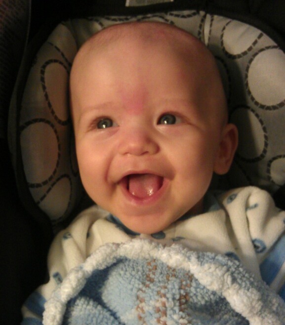 4 month old Cody with huge grin