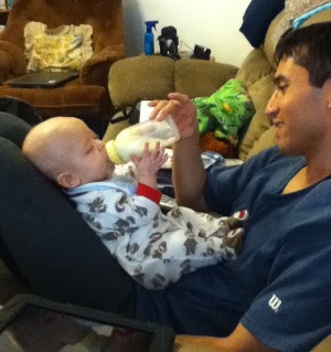Dad feeding Cody his bottle
