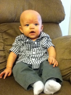 Cody sitting on couch