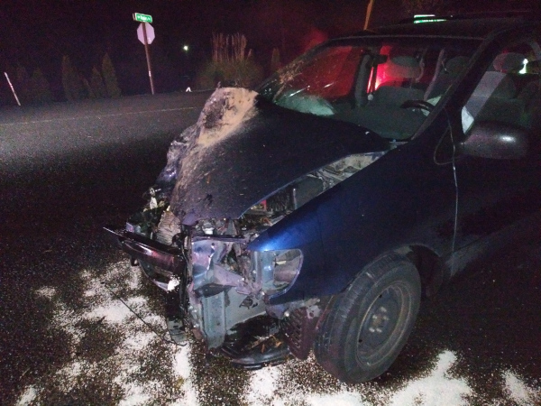 Van with the front crushed in